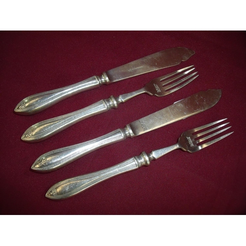 13 - Two pairs of silver plated LNER railway carriage fish knives and forks