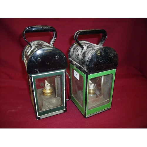 23 - Two similar railway hand lamps and one marked NE on the handle