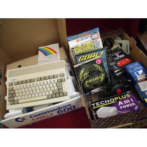 285 - Commodore Omega 600 in original box and various games, floppy disks and accessories (2 boxes)