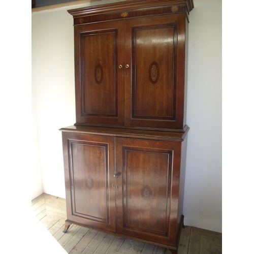 361 - 19th C oak and mahogany cross banded and inlaid two sectional cabinet with upper bookcase top enclos... 