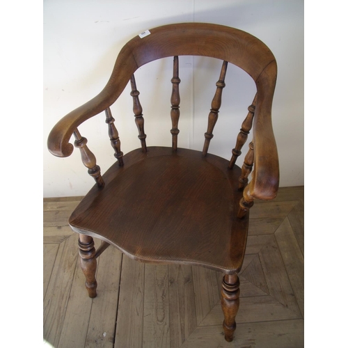 362 - 19th/20th C elm office style armchair on turned supports and double H shaped under stretcher