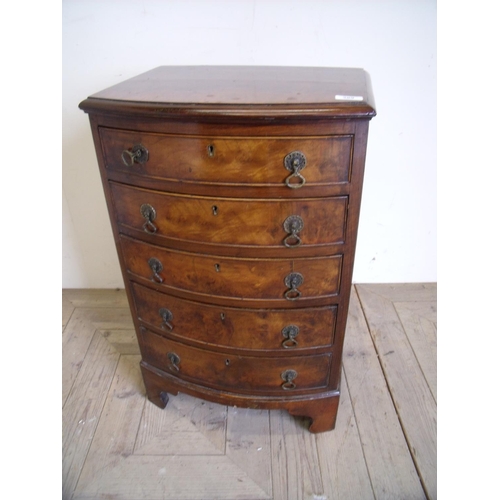 366 - Reproduction walnut bow front dwarf chest of five drawers on raised bracket supports (46cm x 36cm x ... 