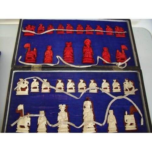 26 - Early 20th C Chinese carved red & white ivory chess set with lacquered box board