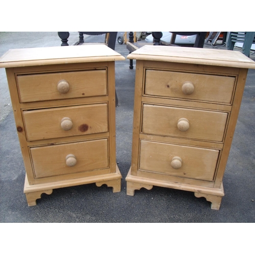 351 - Pair of waxed pine three drawer bedside chests (47cm x 34cm x 66cm)