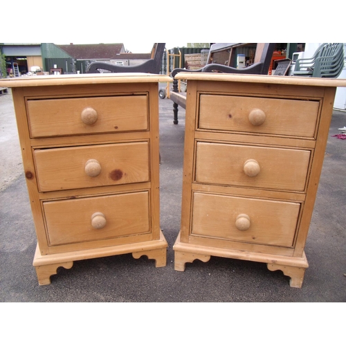 352 - Pair of waxed pine three drawer bedside chests (47cm x 34cm x 66cm)