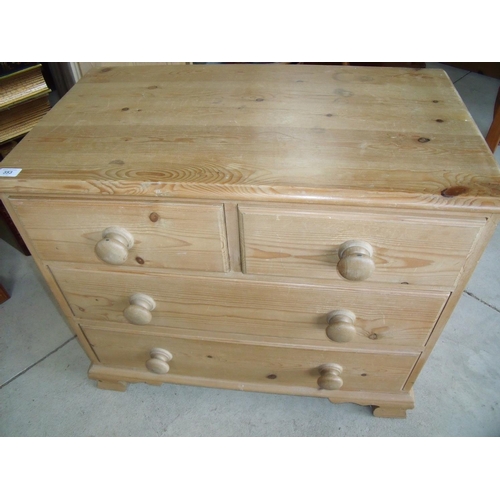 353 - Small waxed pine chest of two short above two long drawers (80cm x 45cm x 68cm)