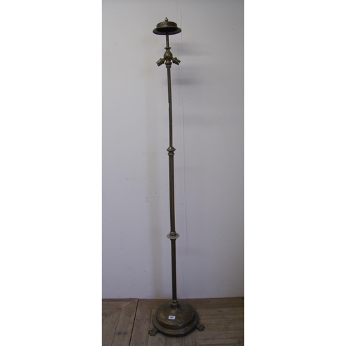 402 - Early 20th C brass telescopic standard lamp with three claw feet