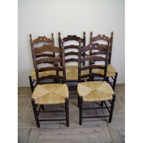 407 - Set of five late 19th/early 20th C beech ladder back chairs with rush seats