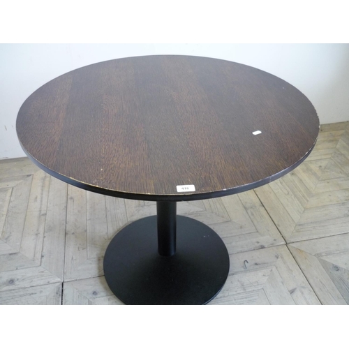 416 - Circular bar/café table with wooden top and cast metal base (diameter 90cm)