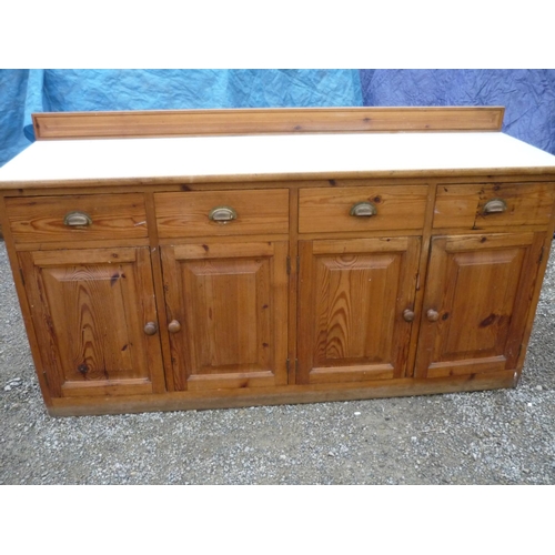 420 - A large pine sideboard with raised back (width 205cm)