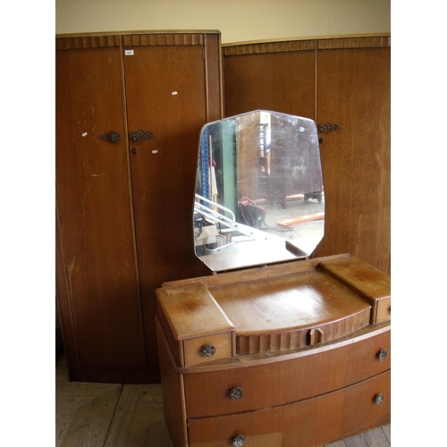 423 - Early 20th C oak three piece bedroom suite comprising of a double wardrobe, single wardrobe and a dr... 