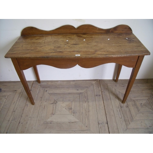 440 - Victorian pine side table with a raised and shaped back