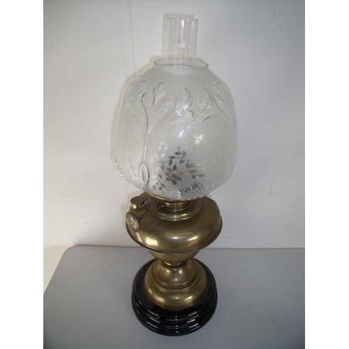 56 - Late Victorian brass oil lamp on turned circular ceramic base with etched and moulded glass shade (5... 