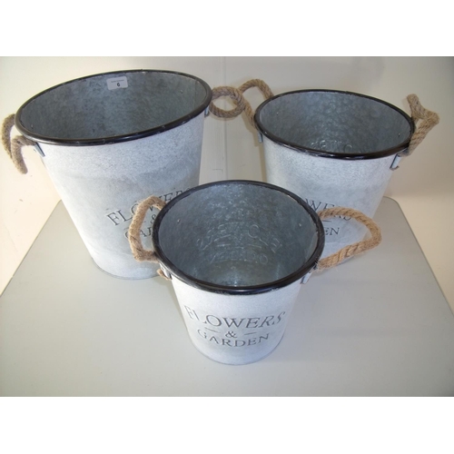 6 - Set of three galvanised flower & garden, rope handle buckets of graduating sizes