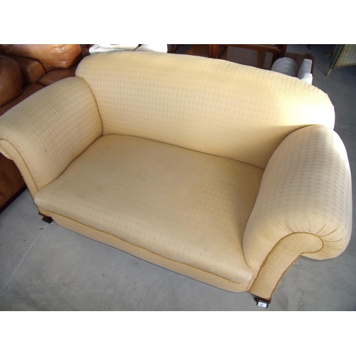 340 - 1930's re-upholstered drop end two seat sofa on mahogany supports (width 160cm)