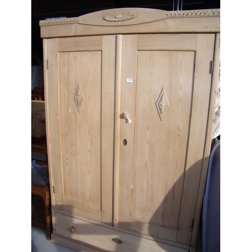 359 - Waxed pine French style double door wardrobe with single drawer to the base (width 120cm)