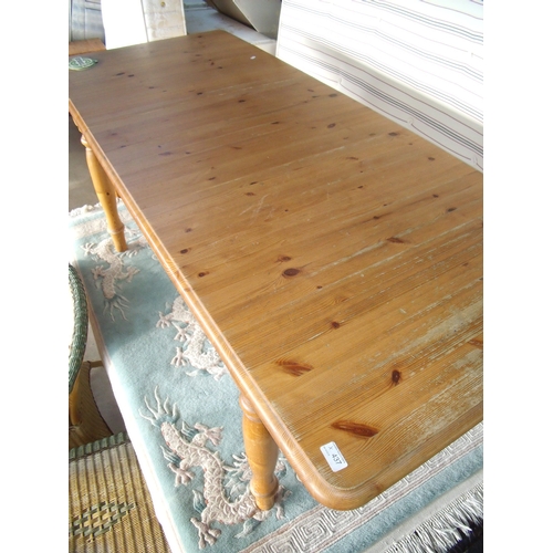 349 - Modern pine rectangular extending dining table on turned supports with additional leaf (minimum leng... 