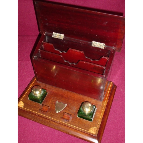 105 - Edwardian mahogany inlaid desk stand with raised letter rack, hinged top revealing fitted interior s... 