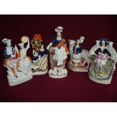 19 - Group of five Staffordshire figures including flat back courting musical couple, lady & sheep and se... 
