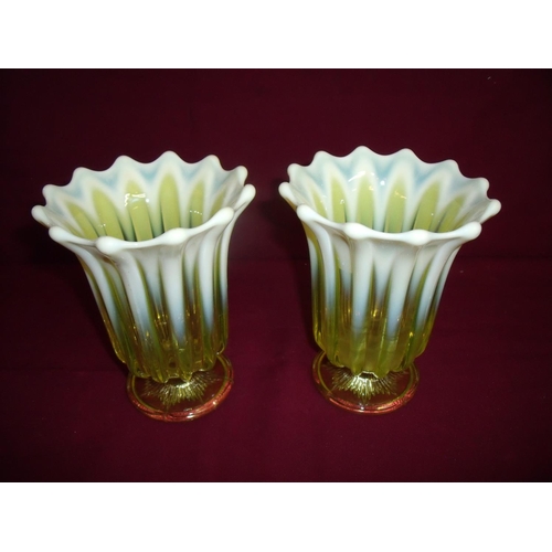 38 - Pair of 20th C moulded Uranium style glass vases (diameter 14cm, 18cm high)