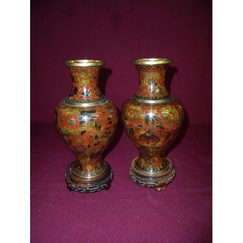 46 - Pair of early-mid 20th C cloisonné ware vases on carved wood stands (27cm overall)