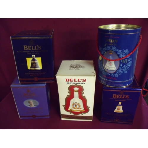 503 - Five cased Bells commemorative whisky decanters (sealed and full) including The Prince of Wales 50th... 