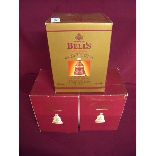 504 - Boxed Bells Old Scotch Whisky Limited Edition Christmas 1999 decanter and two Christmas 2000 Limited... 