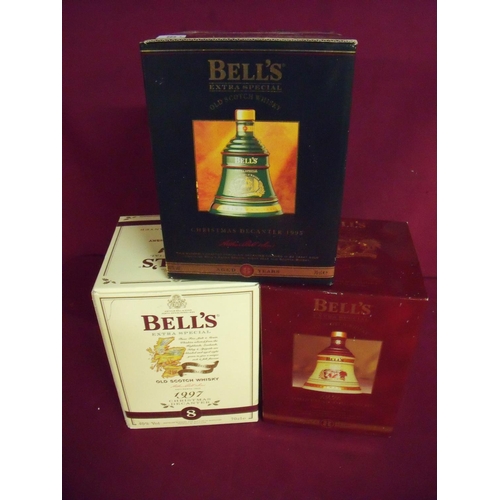 505 - Three boxed Bells Christmas commemorative decanter whisky's for 1995, 1996 & 1997