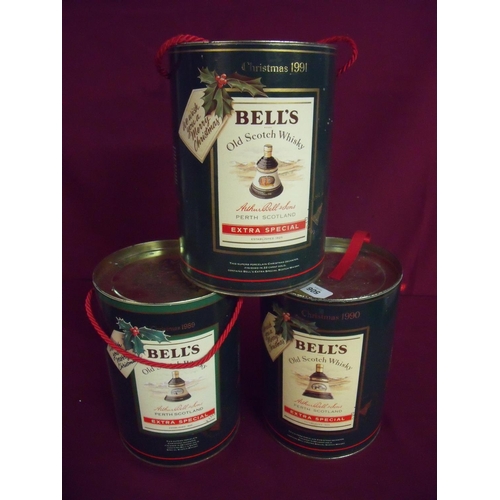 506 - Three cased Bells Christmas commemorative whisky decanter sets 1989, 1990 & 1991