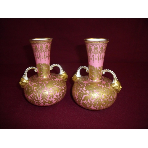 7 - Pair of 20th C Crown Derby pink & gilt bottle flare necked vases with twin handles in the form of fa... 