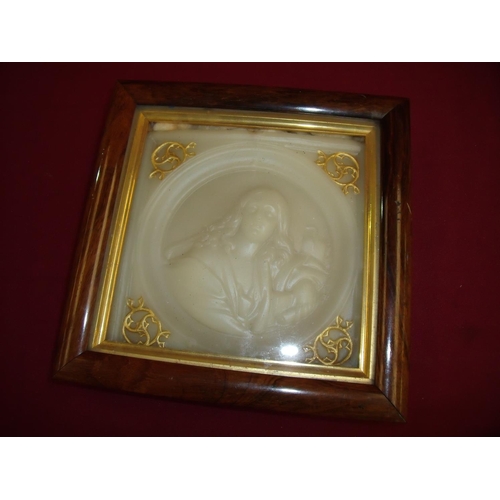 87 - 19th C rosewood framed wax worked panel depicting portrait of womanhood with paper label to the reve... 