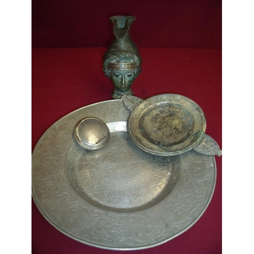 99 - Pewter shallow charger with engraved detail, a twin handled server, a pewter pinched tobacco box and... 