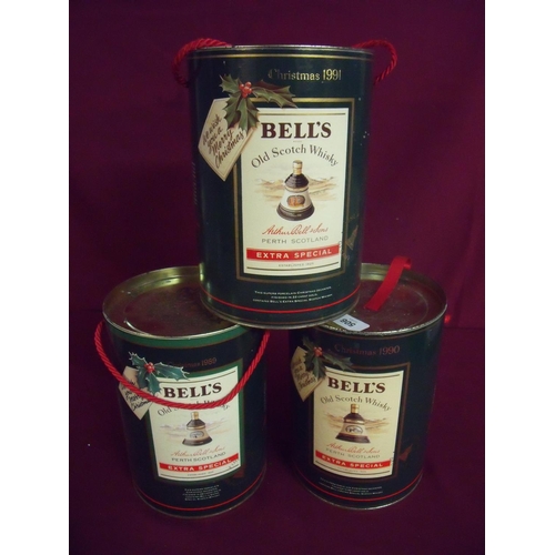 49 - Three cased Bells Christmas commemorative whisky decanter sets 1989, 1990 & 1991