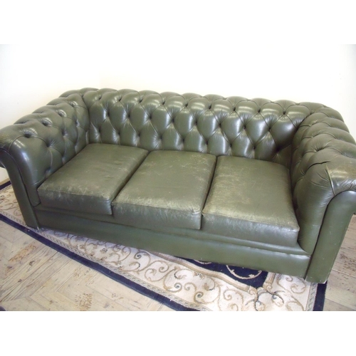 391 - Green leather three seat Chesterfield sofa (width 180cm)