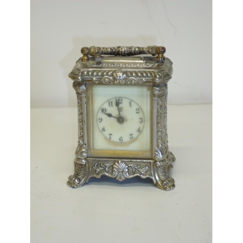 10 - Silver plated Waterbury Clock Co carriage type clock (12cm high)