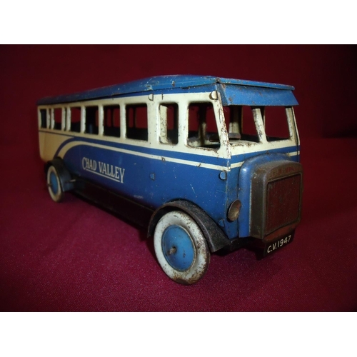 293 - Chad Valley tin plate clockwork single decker bus in blue and cream detail registration C.V.1947