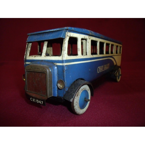 293 - Chad Valley tin plate clockwork single decker bus in blue and cream detail registration C.V.1947