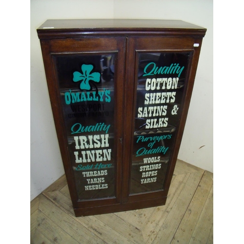 374 - Early 20th C oak bookcase enclosed by two glazed cupboard doors with later painted detail for O'Mall... 