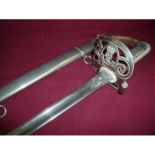 56 - A British Light Infantry officer’s sword with 33 inch part single fullered blade with engraved crown... 