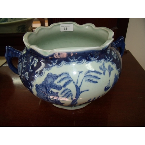 31 - Chinese blue & white twin handled jardinière (18cm high) with four digit signature panel to the base