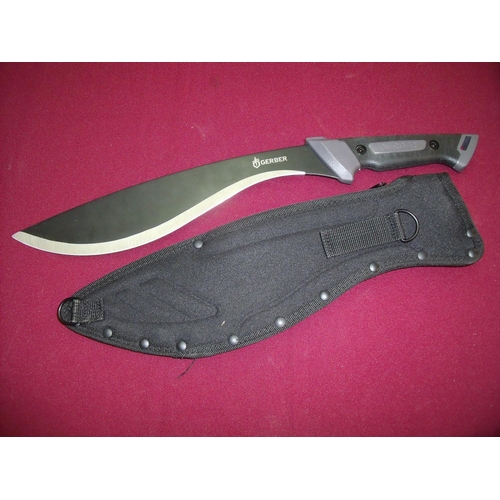 39 - As new Gerber machete style knife with 12.5 inch black blade No 0500517B3 composite grip and canvas ... 