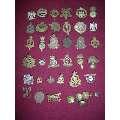 1 - Selection of various British & Commonwealth military cap badges, buttons, shoulder titles etc. inclu... 