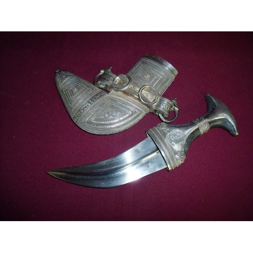 109 - Omani Jambiya with cow horn hilt with 7.5 inch curved blade, bares two 'Lion' armourer’s marks, the ... 