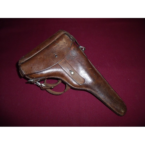 22 - A scarce original Swiss Luger holster for a 7.63mm 06/24 pistol, complete with belt strap, the rever... 