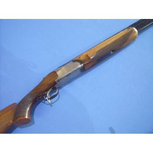 323 - Silma 12 bore over & under single trigger ejector shotgun with 30 inch barrels, choke full & 1/2, wi... 