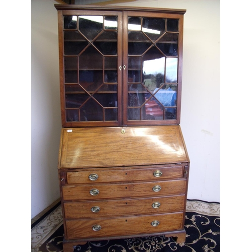 390 - 19th C mahogany bureau bookcase with two upper glazed doors above fall front revealing fitted interi... 