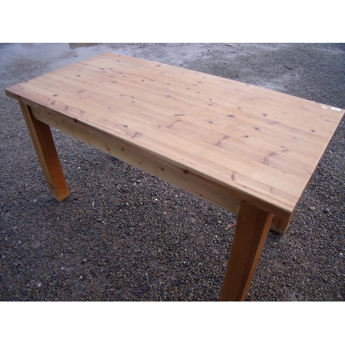 414 - Heavy pine rectangular kitchen table on square supports (77cm x 152cm x 78cm)