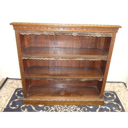 420 - Late Victorian carved oak two tier adjustable height open bookcase (123cm x 35cm x 116cm)