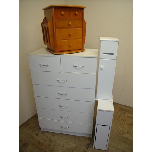 374 - White laminate chest of two short above five long drawers, a pine magazine/storage cabinet, white pa... 