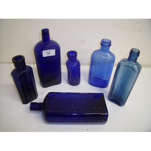 76 - Six blue glass apothecary bottles, mostly labelled including Milk of Magnesium, World Famed Blood Mi... 